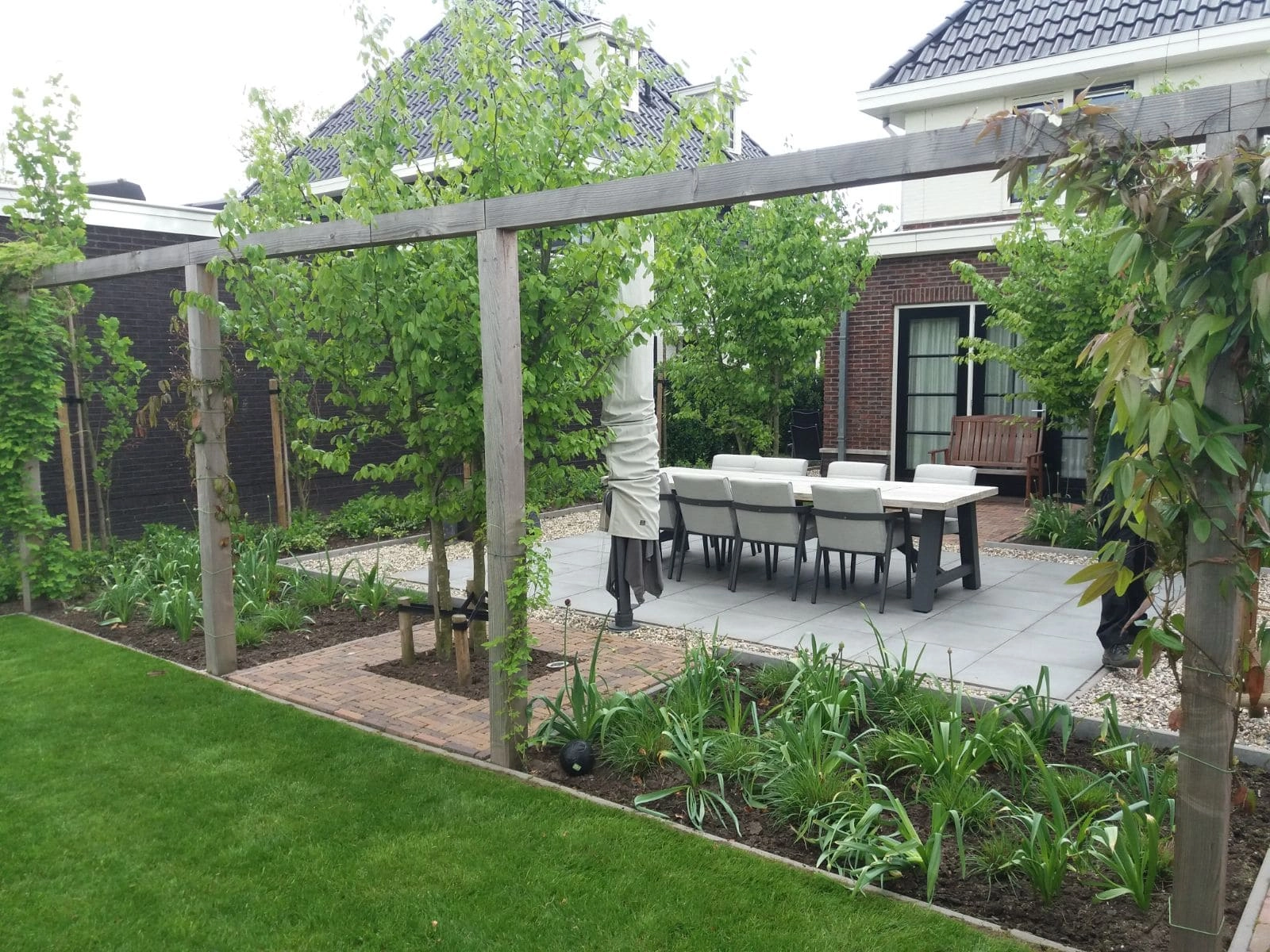Update landelijke en strakke tuin in Houten